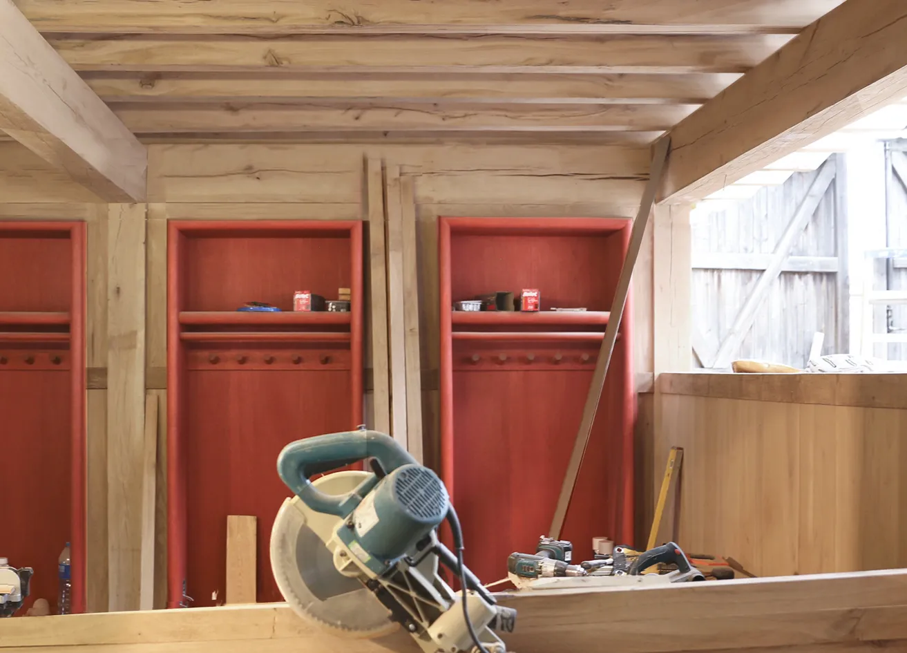 red club lockers within the timber structure