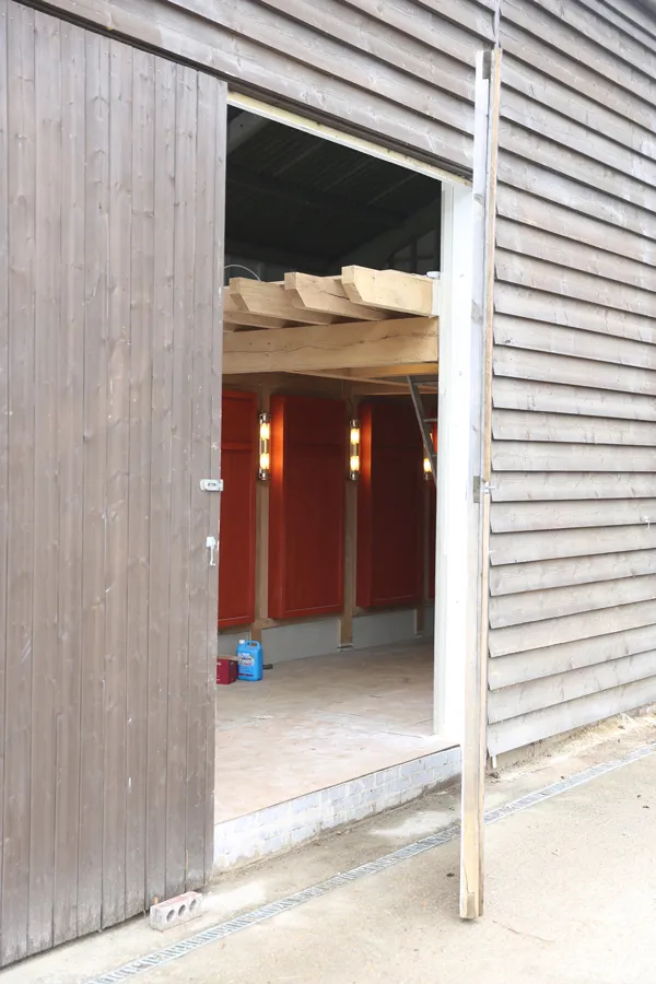 view to changing rooms from outside barn