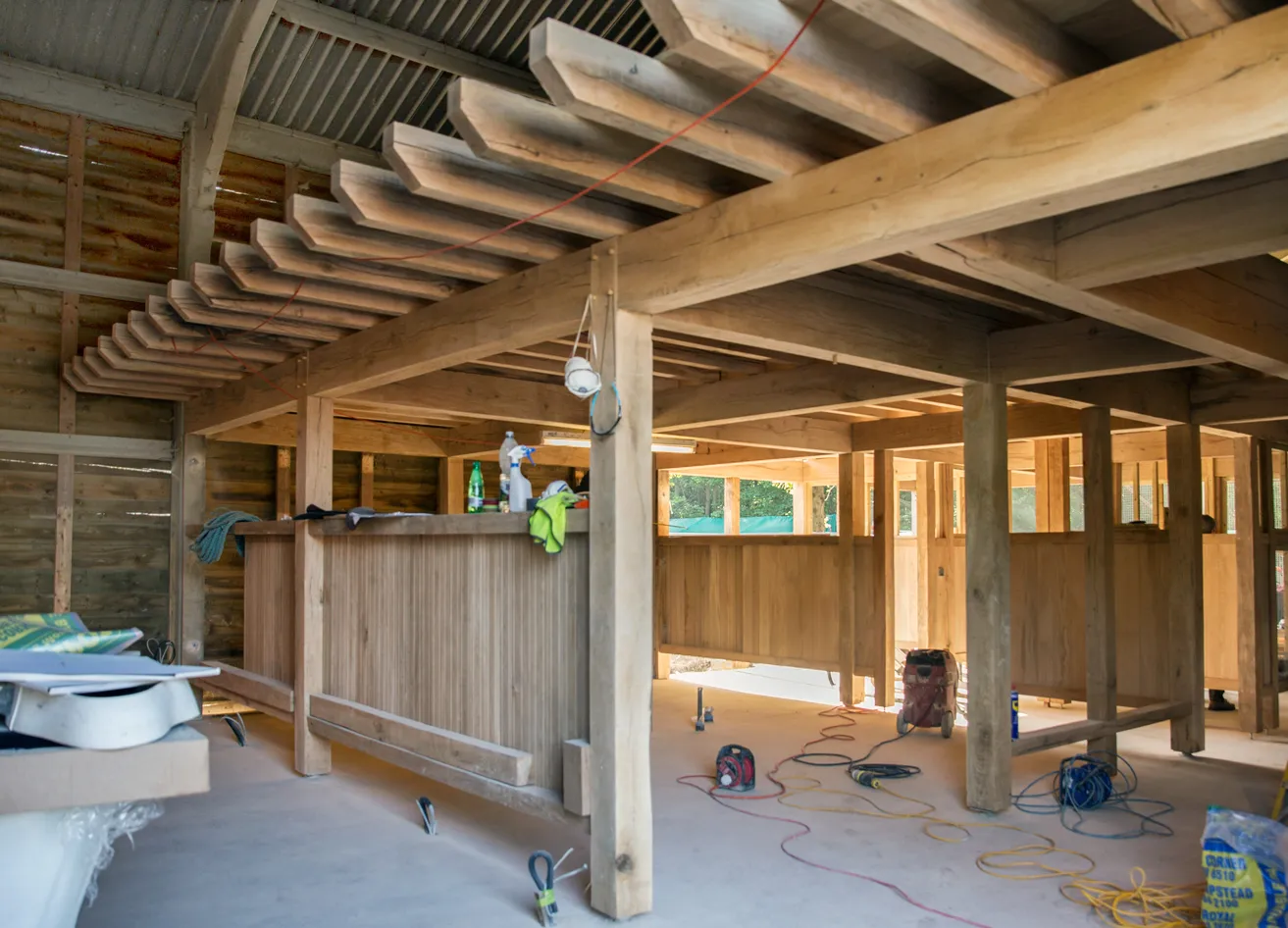 oak structural frame and partitions under construction