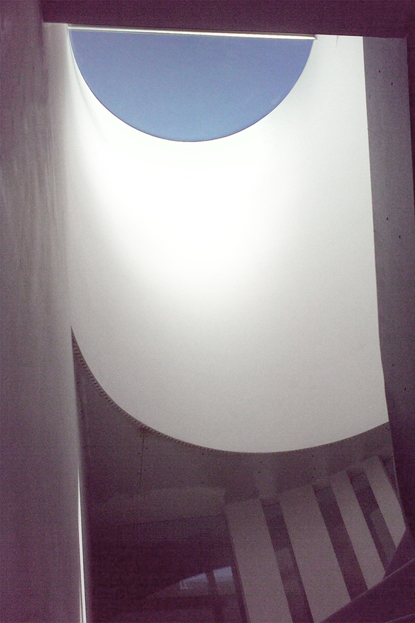 round rooflight lighting the staircase 