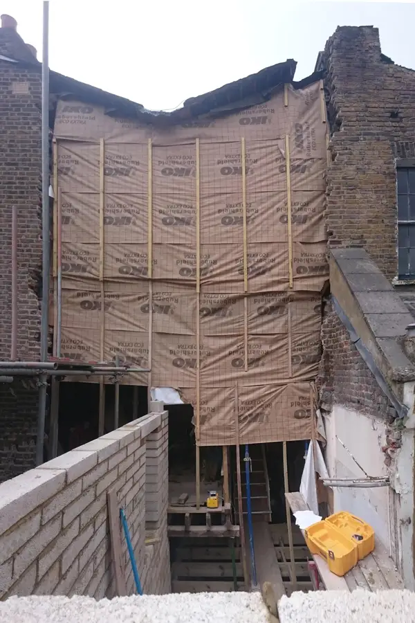 rear elevation of victorian terraced house with rear addition temporarily demolished