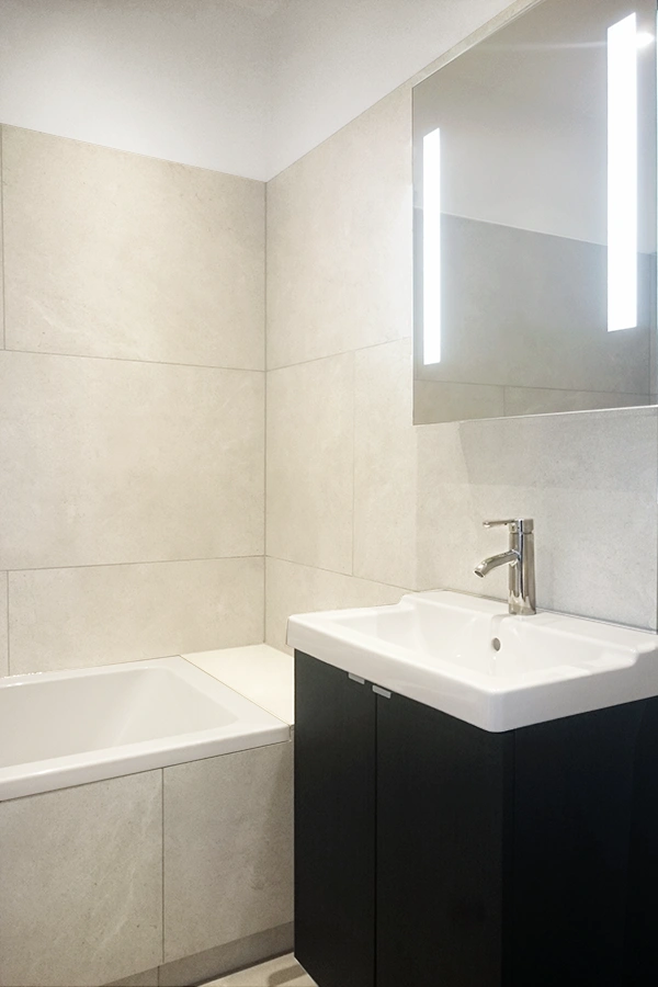 bathroom with limestone effect porcelain tiles