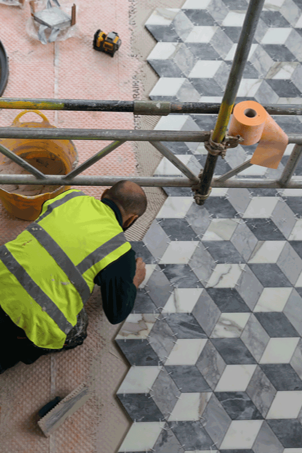 laying stone floor tiles for roof terrace