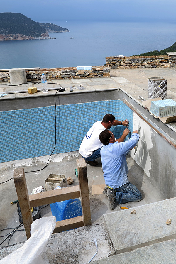 tiling the swimming pool with mosaic