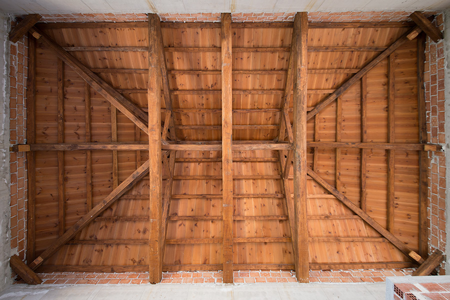 completed timber roof structure viewed from below
