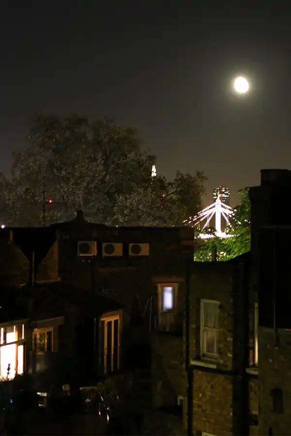 night view from living room with Albert Bridge and the Shard illuminated in background