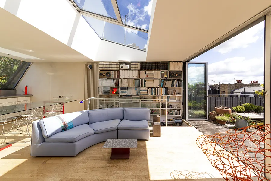living room with terrace and skylight