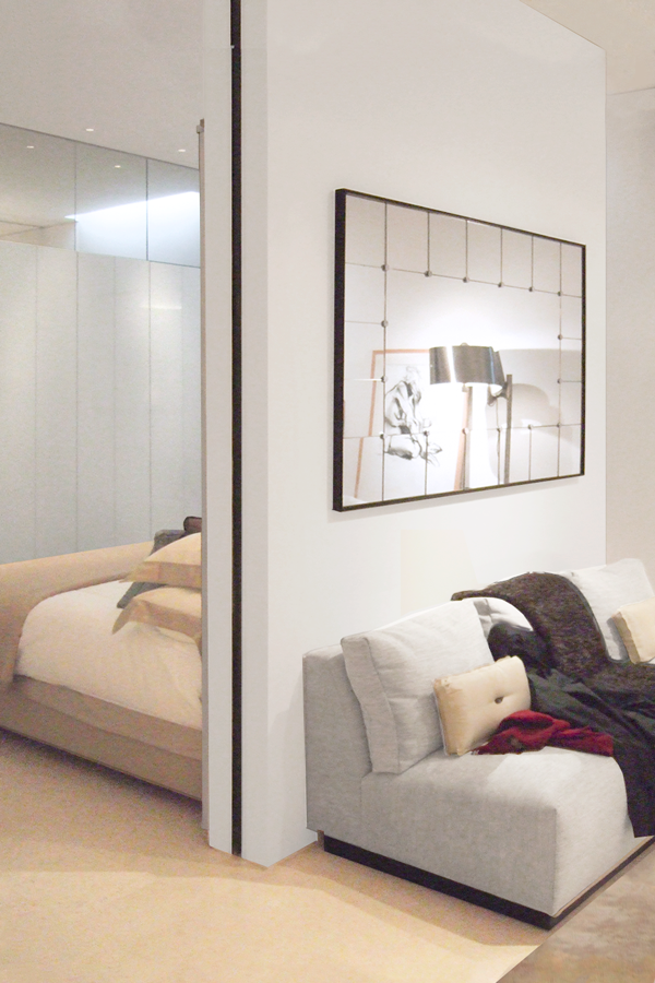 Mirrors in the living room and bedroom enhance the sense of space, as well as raising light levels