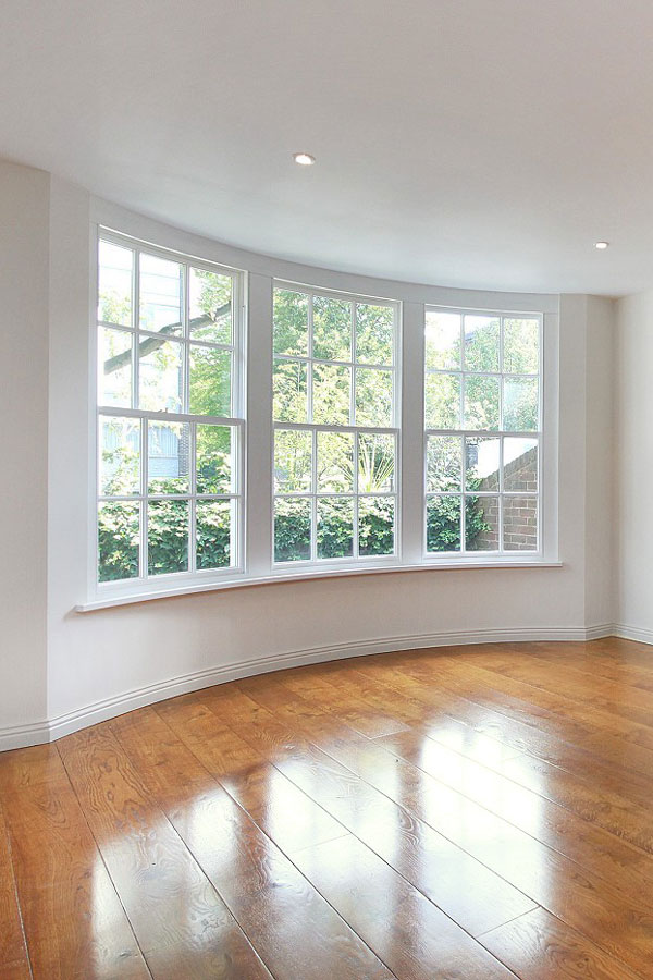 Curved window open on the garden