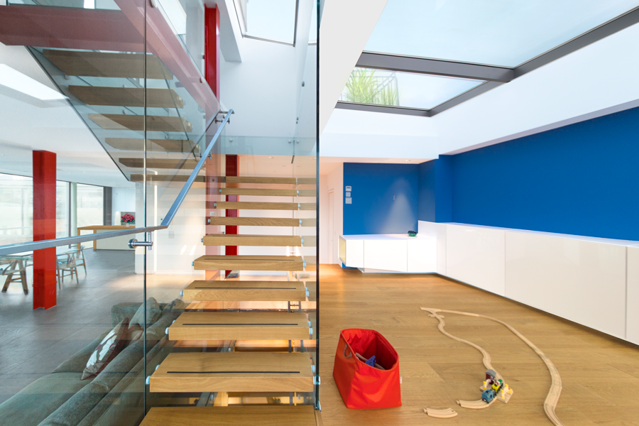 Floating stair through reception areas to roof terrace