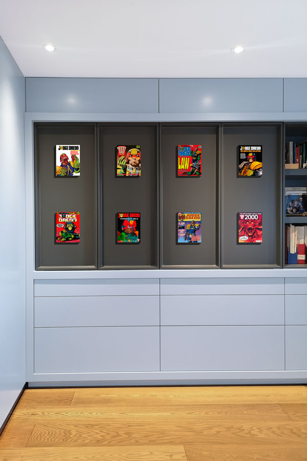 Hidden office cabinets behind comic display doors