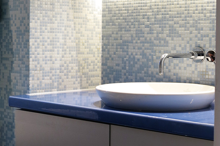 Bathroom with Bisazza mosaic and Pyrolave blue counter