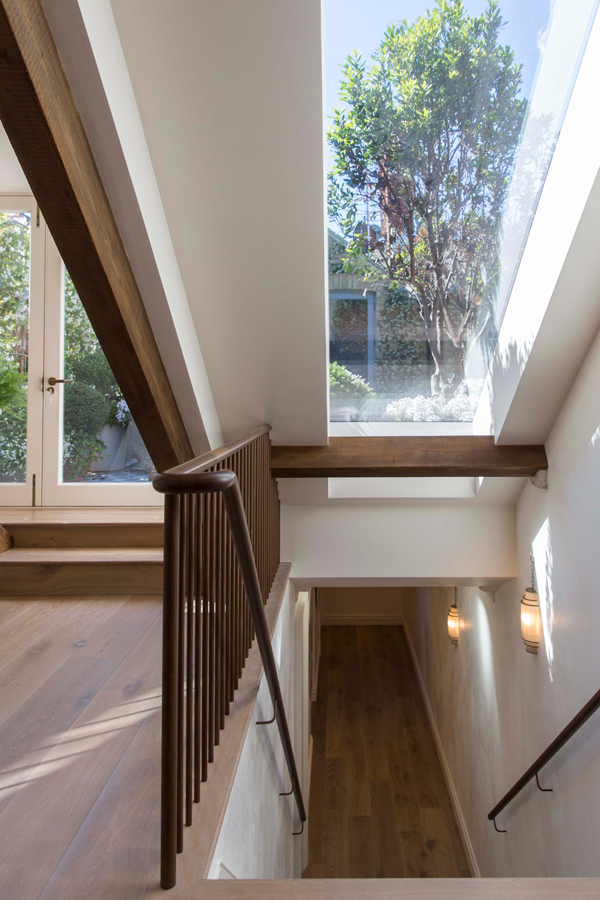 View of roof terrace through rooflight over main stair