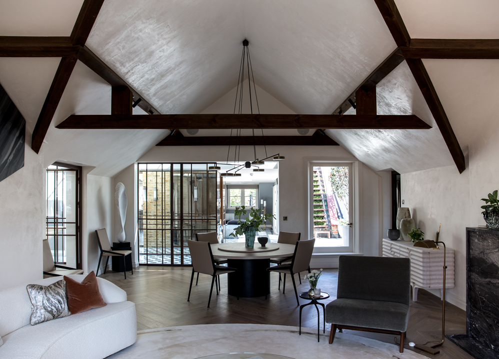Contemporary living room with exposed timber beams