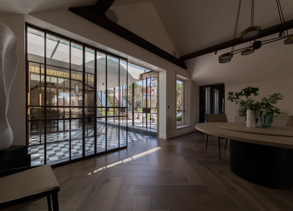 Sliding glazed doors to entrance hall