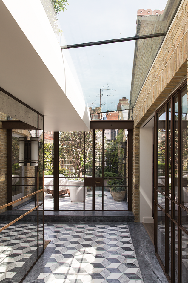 New glass extension with rooflight and terrace garden