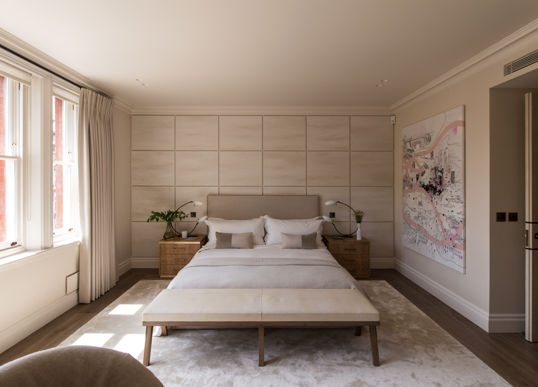 Master bedroom with panelled wall