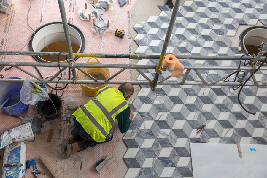 Bespoke tiled marble floor under construction