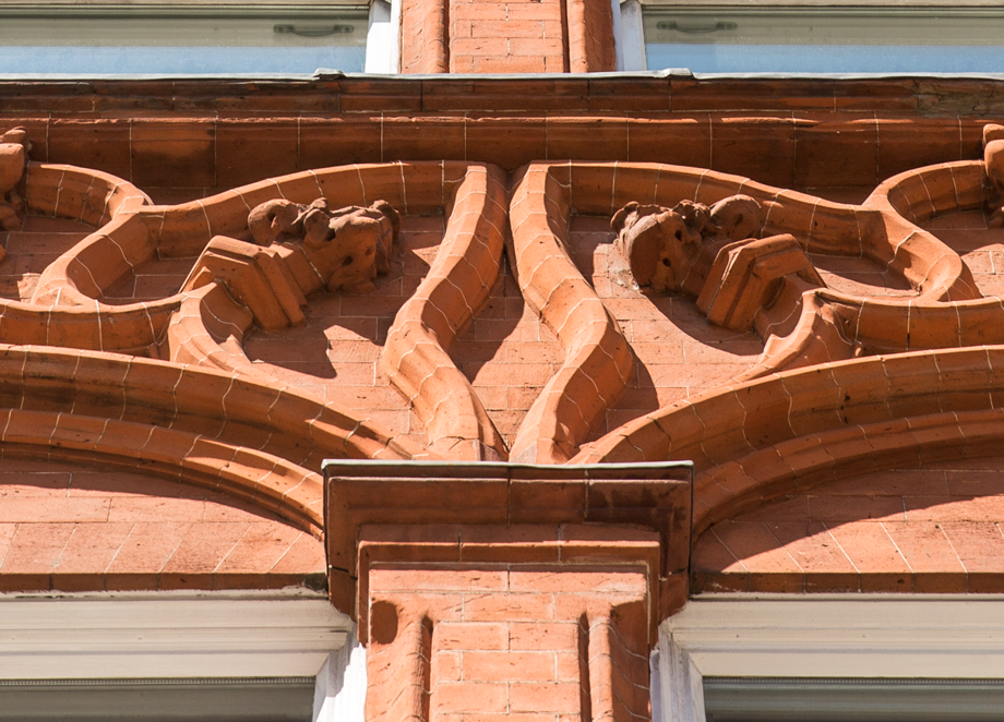 Red brick listed facade detail on Pont Street
