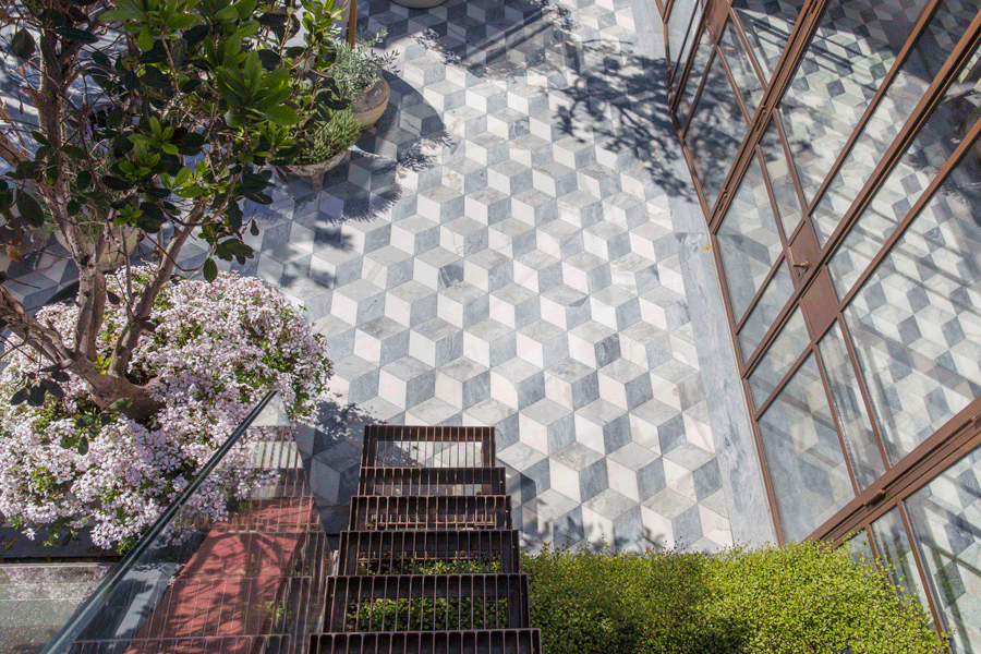 Marble floor to roof terrace, with bronze doors