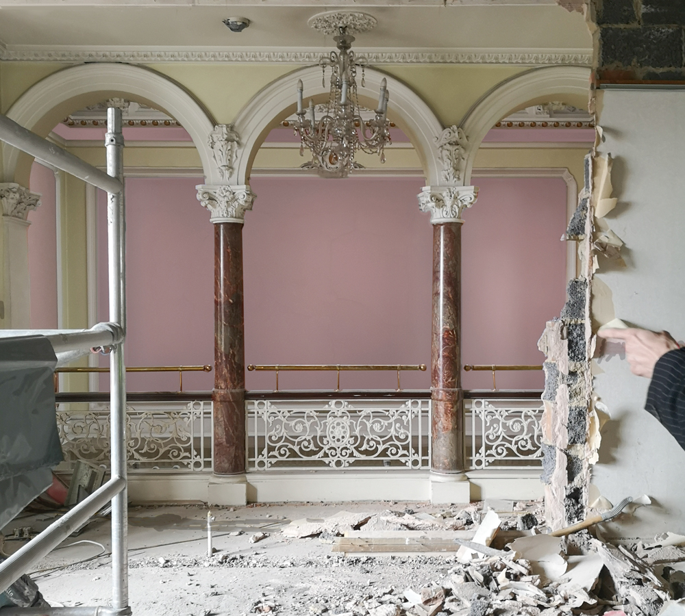 Partitions being removed to reconnect the floor with the lightwell
