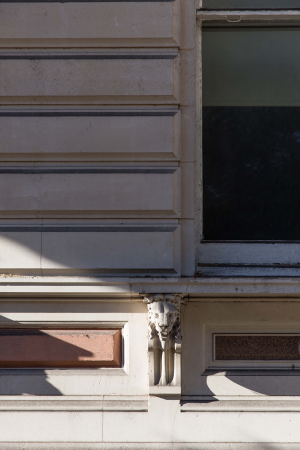 Carved lion detail on the facade