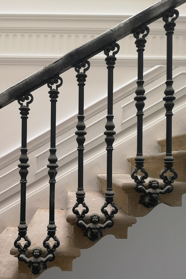 Cantilevered stone stair balustrade