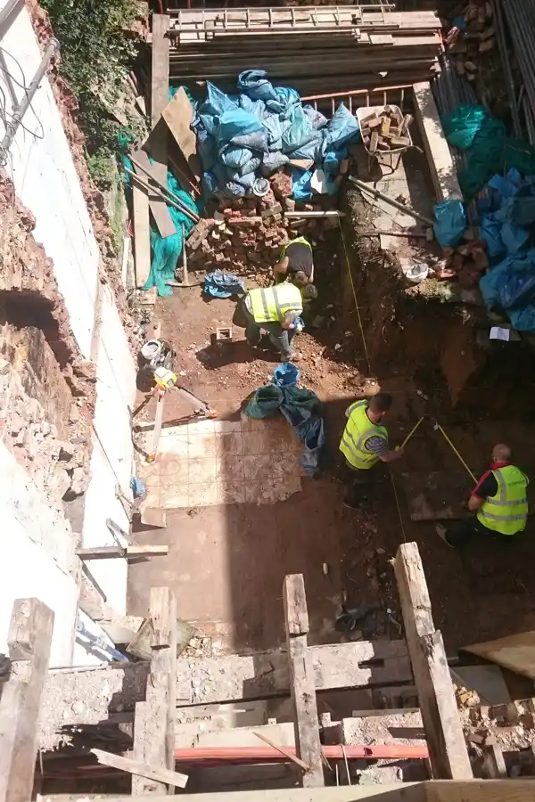 Workmen on site seen from above