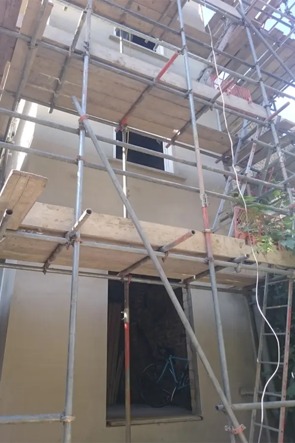 New rear extension with scaffolding and new windows