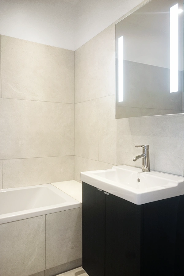 Bathroom with limestone effect porcelain tiles