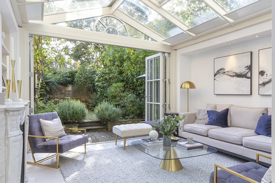 Conservatory from entrance, with sliding doors fully open to garden
