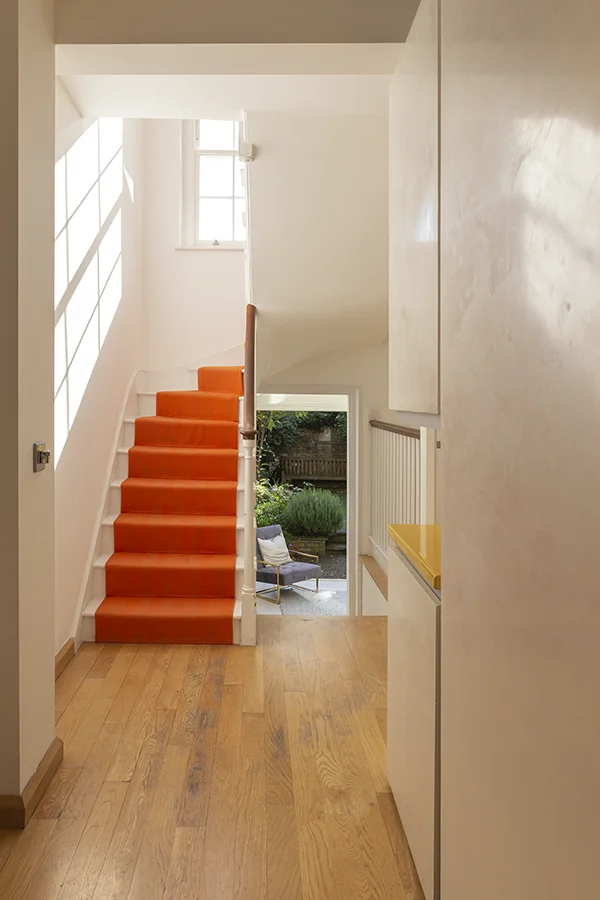 Entrance corridor with oak floor and original staircase