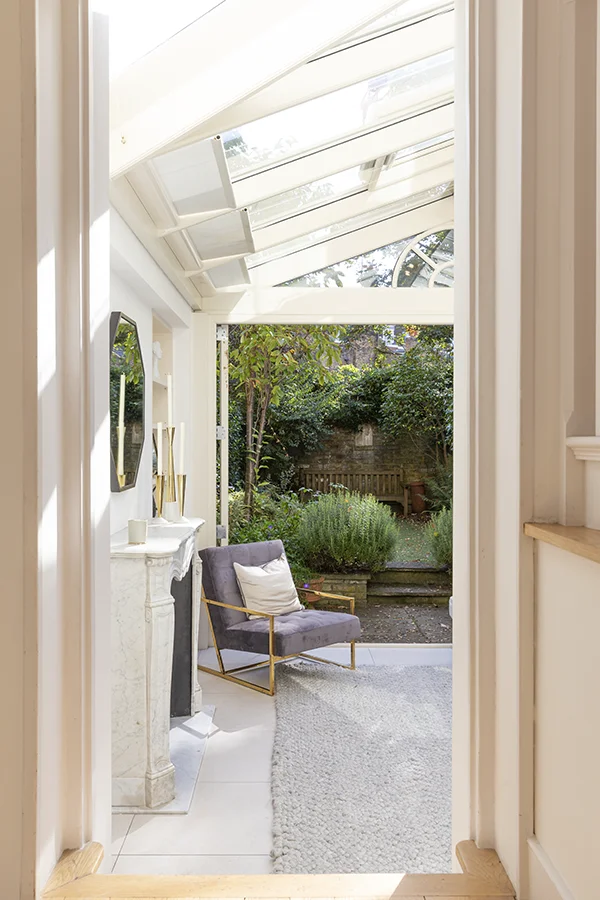 Entrance to conservatory and garden beyond