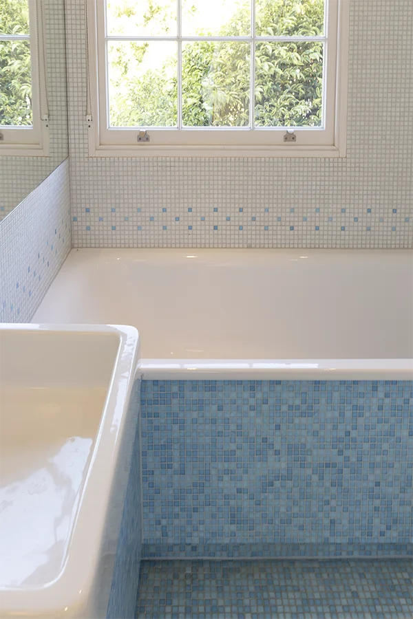 Blue and white mosaic to family bathroom
