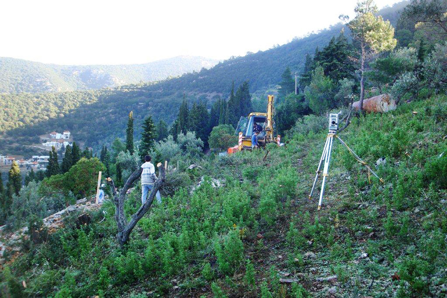 Surveying the site to set out the houses
