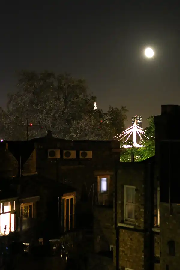 Night view from living room with Albert Bridge and the Shard illuminated in background