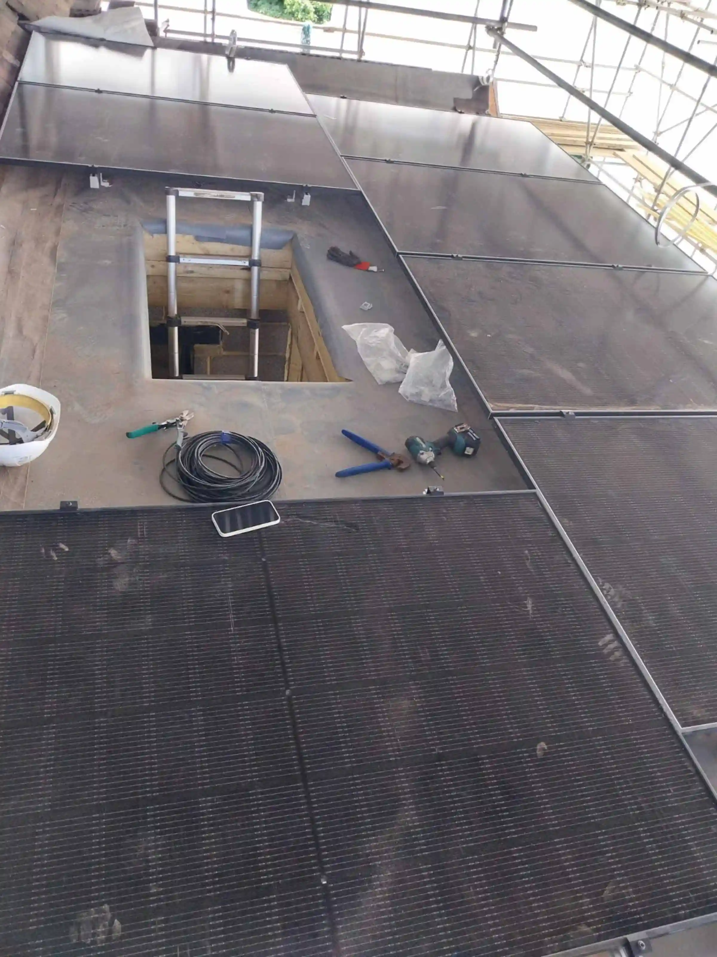 Solar photovoltaic panels installed to the new extension flat roof