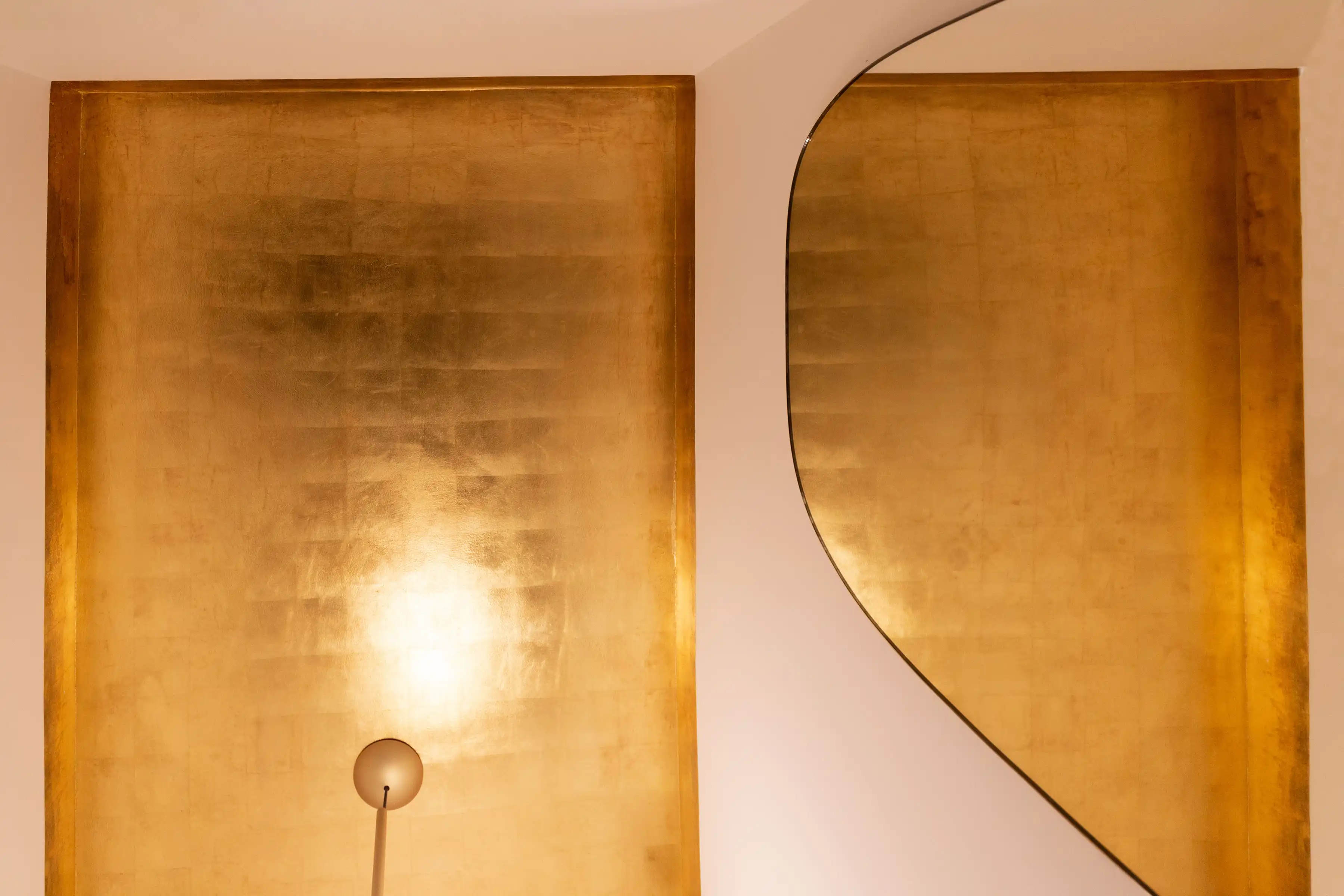 Guest WC detail at Staverton Road Oxford — gold leaf ceiling to WC and wall mirror